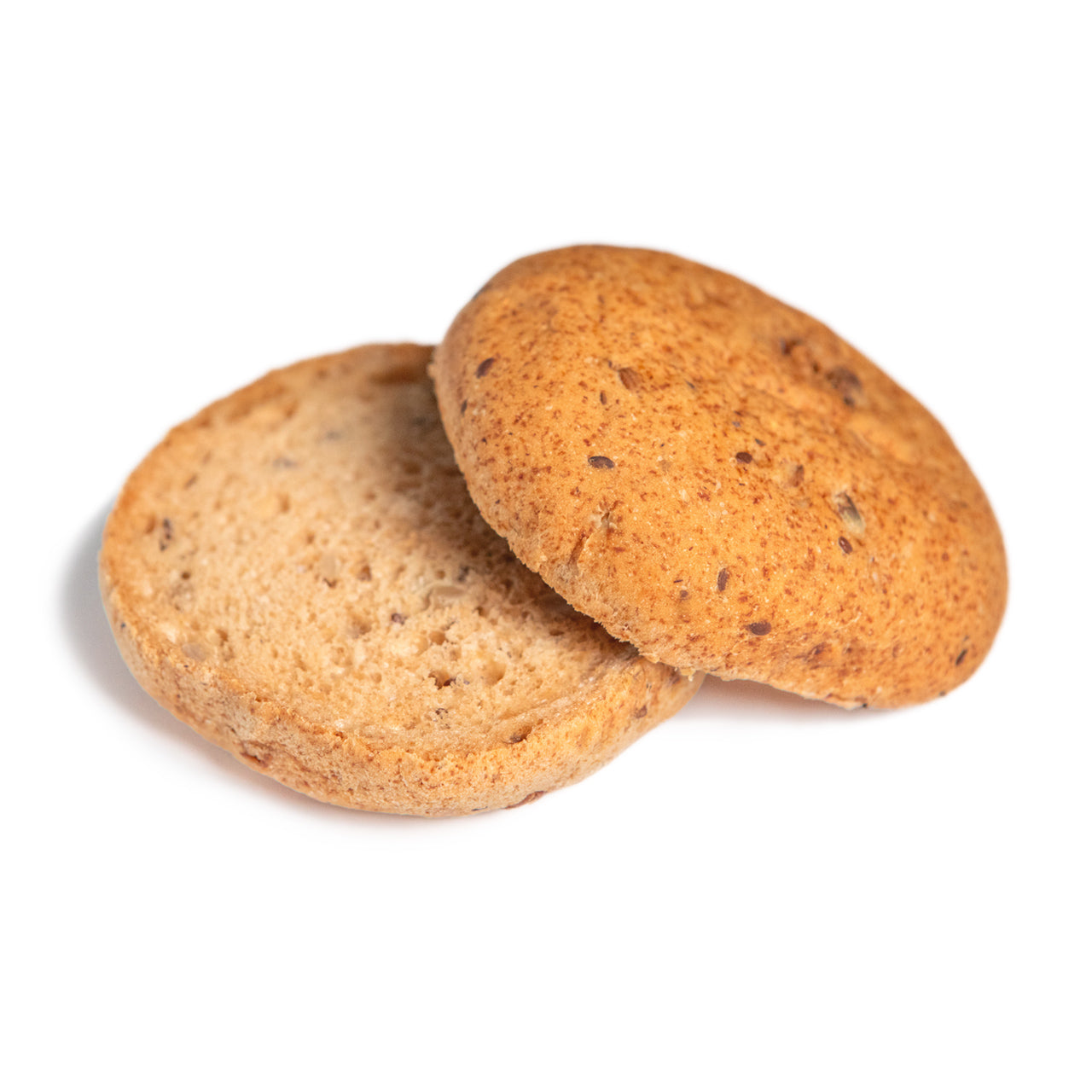 Round golden-brown seeded burger bun stacked slightly offset on a plain white background.
